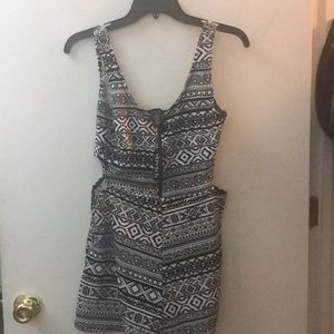 romper  cut out sides to show off your waist.